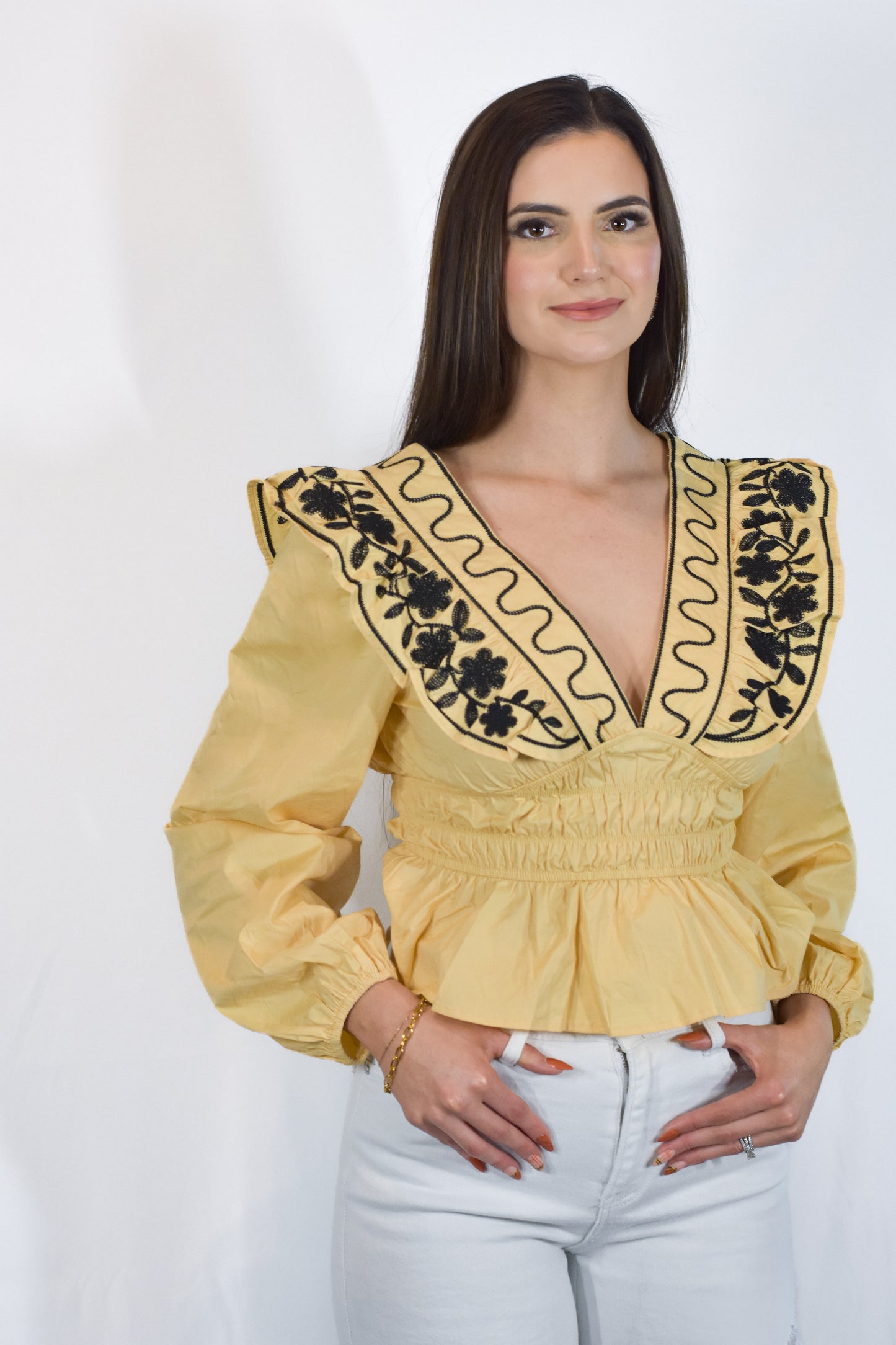 EMBROIDERED RUFFLED PEPLUM TOP